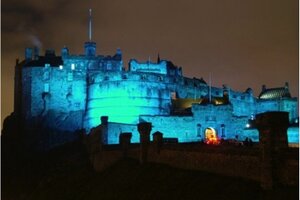 CastleEsplanade_02 - View of Edinburgh castle lit up in blue light at night