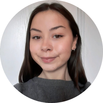Madeline Do Couto - Madeline is a professional female with long brown hair, smiling softly, wearing a grey jumper in a professional staff photo for Bookster Marketing Software.