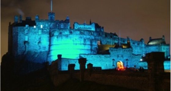 CastleEsplanade_02 - View of Edinburgh castle lit up in blue light at night