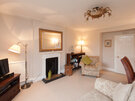 Hart Street Apartment-19 - Family living room with large wall mirror in luxury Edinburgh holiday let