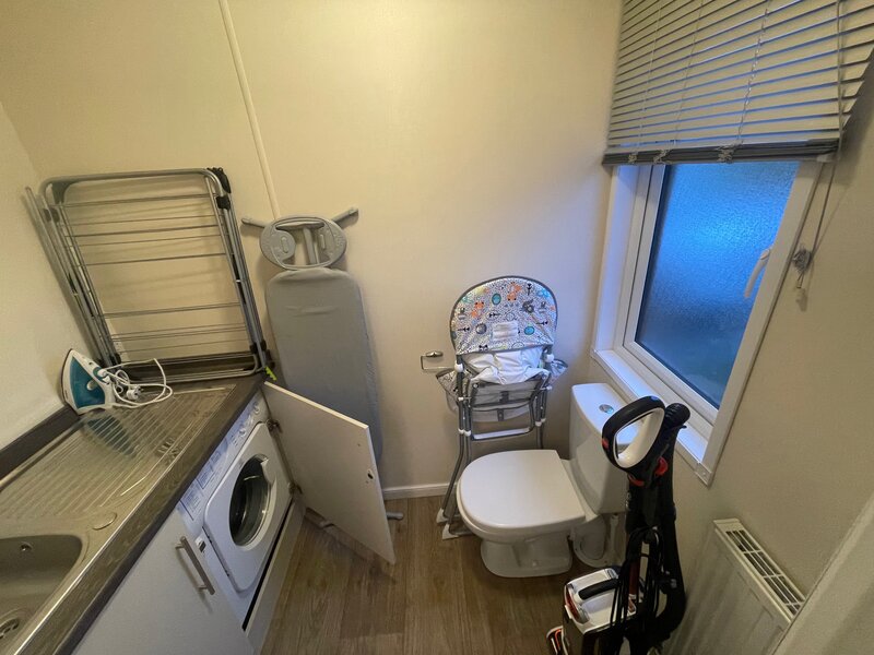 Third toilet, washing machine