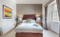 20-web-or-mls-242 West George Street Lomond_20 - Inviting bedroom with plush bedding for a restful night’s sleep