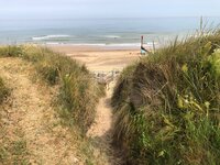 A pathway to the sandy beach of Eccles on sea