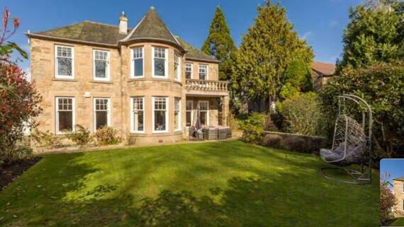 Stunning, Family-friendly Property - A stunning view of the home’s beautiful stone exterior surrounded by lush greenery