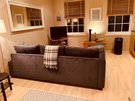 Webstersland 2 - Relaxing sofa in Edinburgh open plan holiday home.