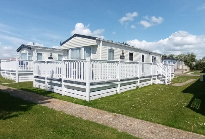 Outside view of Cwtch with Veranda - Outside view of Cwtch with Veranda and seating are a private car parking space Outside view of Cwtch with Veranda - Outside view of Cwtch with Veranda and seating are a private car parking space