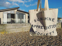 Bag in front of holiday lodge on Bracklesham Bay