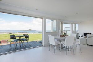 Clova Penthouse - living area - Open plan living area with full height windows looking out to North Berwick bay