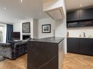 Open-plan living room/kitchen - A stunning open-plan living room/kitchen of Edinburgh self-catering apartment.