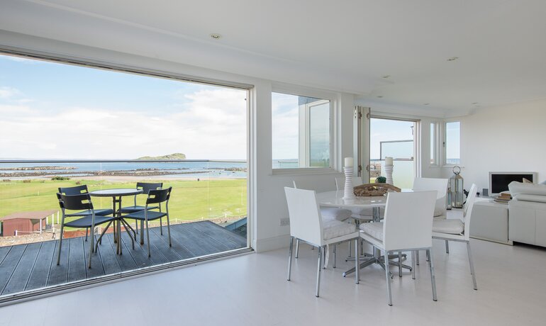 Clova Penthouse - living area - Open plan living area with full height windows looking out to North Berwick bay