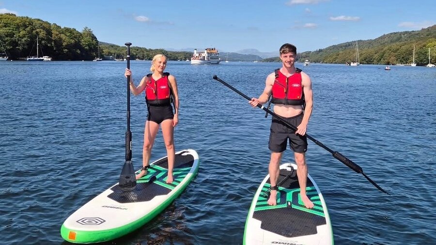 Paddleboarding on Windermere - a couple paddelboarding on Windermere (© Stoked Watersports)