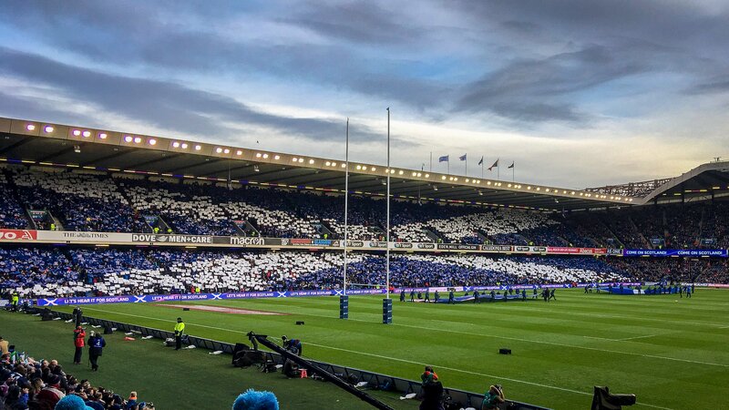 Murrayfield Stadium in Edinburgh on matchday - Murrayfield Stadium on a Six Nations matchday (© Calum404 on Wikipedia)