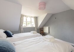 Twin bedroom with eave ceiling