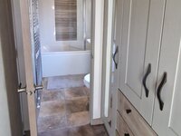 Dressing area to ensuite bathroom
