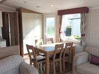 Dining area and fridge freezer