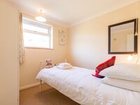 Bedroom at The Crest Holiday Cottage