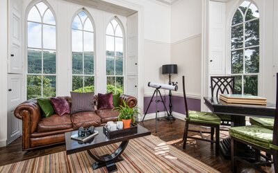 Views From Lounge Windows of Arrochar - Telescope facing the hills through big, arched windows