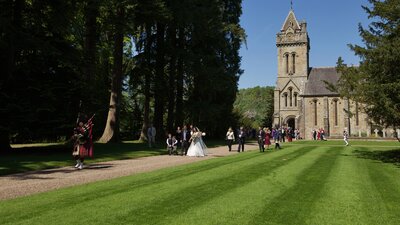 Murthly Castle Chapel wedding procession - Newly weds follow the Piper from Murthly Chapel to Murthly Castle (© Nigel Lumsden)