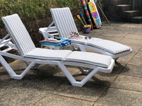 Sun loungers on a private patio