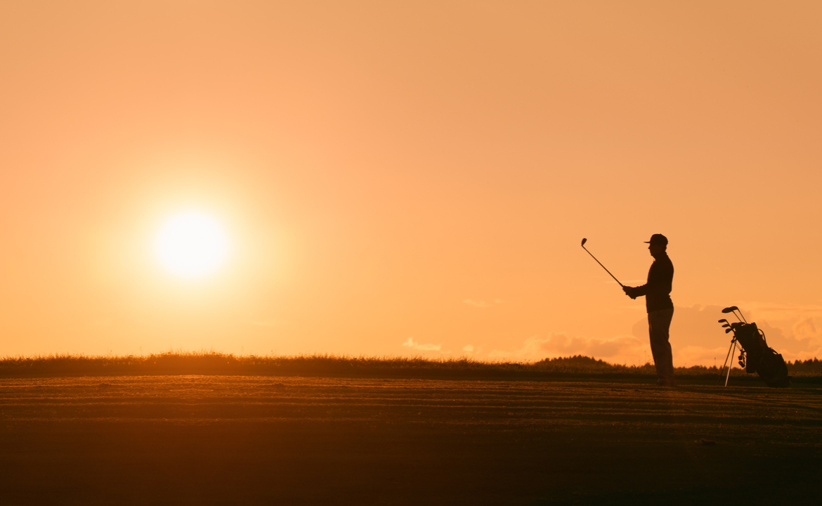 Golfing at sunset