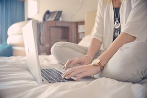Woman booking a holiday online