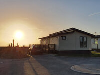 Sunset over the holiday lodge in Seal Bay Resort