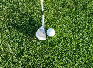 Golf at Gullane Golf Club - Golf ball and club on grass. (© Robert Ruggiero)