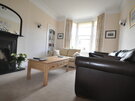 Holiday Lets and Golf Scotland - Living room at Links Corner (© Coast Properties)