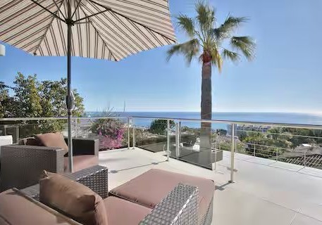 Sun-drenched terrace with sea view