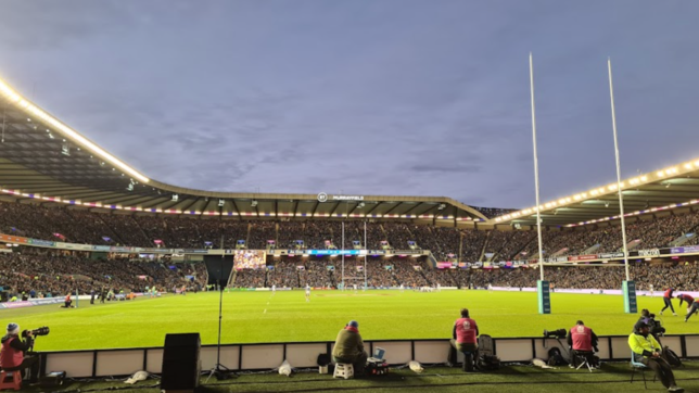 Match day at Murrayfield in Edinburgh - A green rugby pitch with open roof. (© C. Guthrie)
