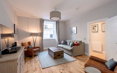 Lounge Area in a Holiday Home in Edinburgh - Spacious lounge with grey and brown colour scheme in Edinburgh, West End