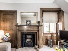 GILLIAN THE NEUK 23.04.26-19 - Welcoming family living space with feature fireplace and soft furnishings in East Lothian self-catering accommodation.