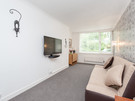 Marchfield Park 8 - Large family lounge with decorative feature wall in Edinburgh holiday let