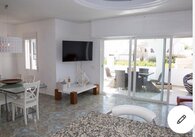 Salón comedor con puertas pario 18341-villa-en-alquiler-en-mojacar-playa-456636-xml