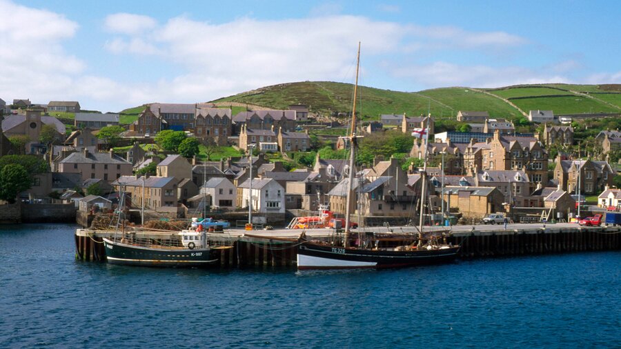 Looking Across The Harbour To The Pier and The Main Town Of Stromness On An Inlet Of Hoy Sound, Mainland, Orkney (© VisitScotland / Paul Tomkins)