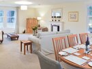 Mulberry Lodge - Dining table and chairs, within large open plan living room/kitchen with views to the garden in East Lothian holiday home.