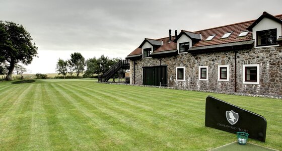 Golfing Experience in a Holiday Home - Pristine golf course, featuring rolling greens and a tranquil setting for an exceptional golfing experience