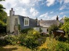 SeaPink Cottage - Holiday home in North Berwick with mature plants and trees.