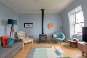 Living room at Rooftops - Cosy living room with wood burner and TV at North Berwick holiday let