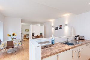 Edmonstone's Close (Grassmarket) 3 - Modern family living space with comfortable sofas, dining table and kitchen