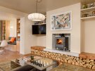 Living Area - Feature wall with log burning stove, log fireplace and wall mounted TV in stylish, open plan living area in North Berwick holiday home.