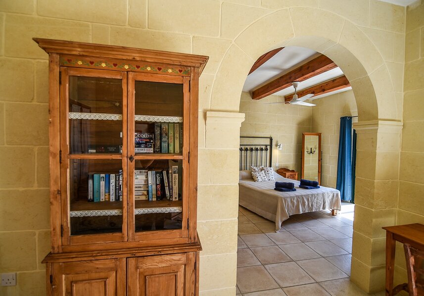 15. Main bedroom with ensuite and terrace overlooking pool area