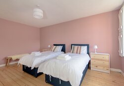 Twin room at SeaPink Cottage