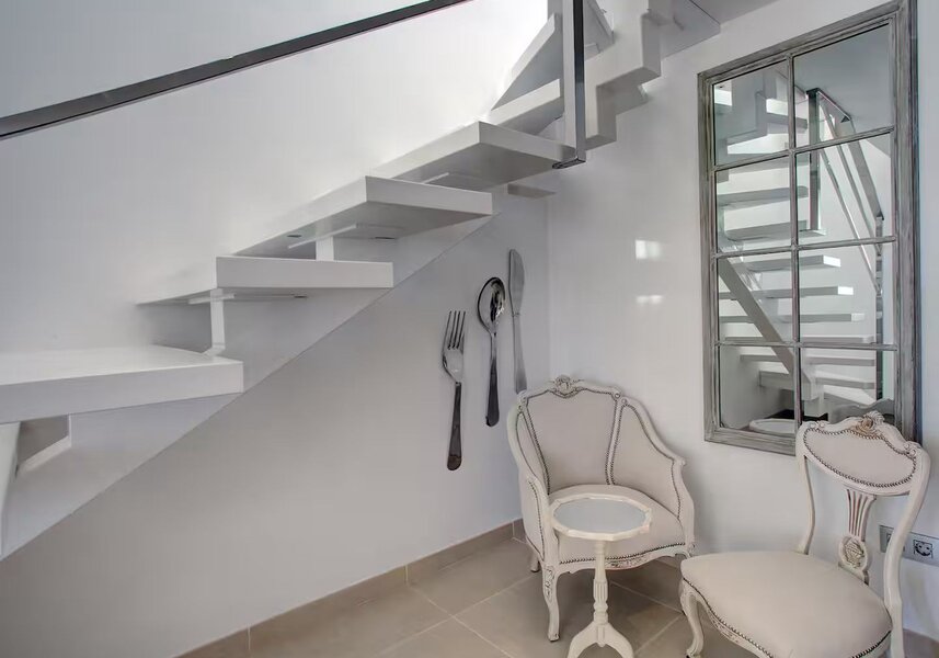 Charming Stairwell Seating Area