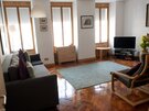 Riddles0004 - Living area with parquet floors and TV in Edinburgh holiday let