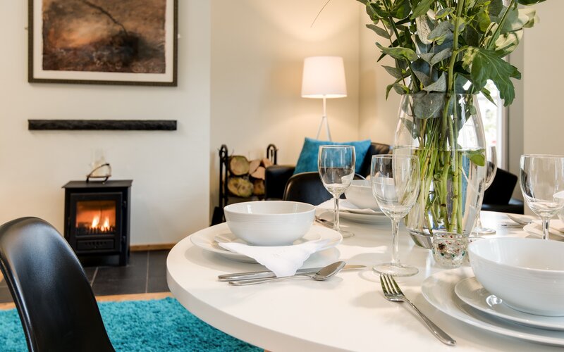 Cosy Dining Room in a Corporate Stay - Congregate in the dining room, where sumptuous seating and ambient décor create a welcoming atmosphere Cosy Dining Room in a Corporate Stay - Congregate in the dining room, where sumptuous seating and ambient décor create a welcoming atmosphere