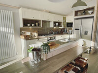 Spacious kitchen with island in a holiday lodge in Seal Bay resort
