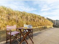 Private patio with direct beach access