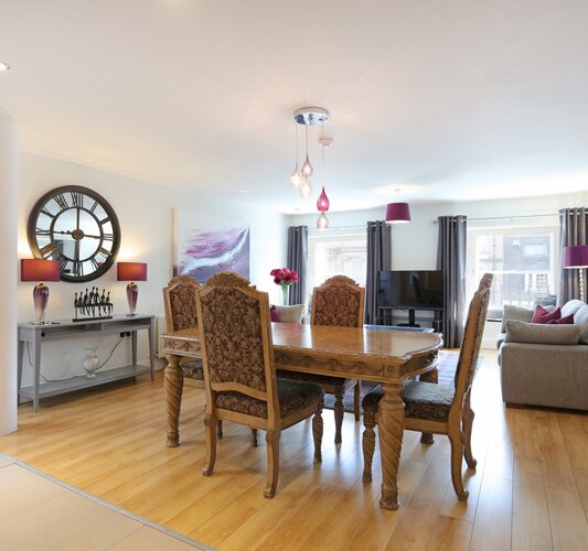 1V7A9413 - Dining table and chairs in open plan Edinburgh apartment.