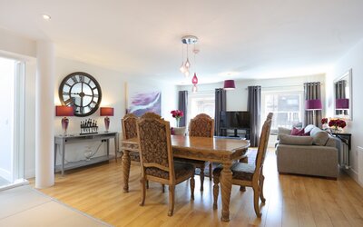 1V7A9413 - Dining table and chairs in open plan Edinburgh apartment.